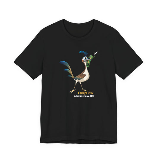 A black short-sleeve crewneck t-shirt featuring a cartoon graphic of the Curly Crow Roadrunner with the text 'Curly Crow' and 'Albuquerque NM' printed on the front, shown against a plain white background.