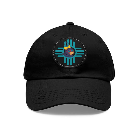 Black cap with an embroidered design on a white background