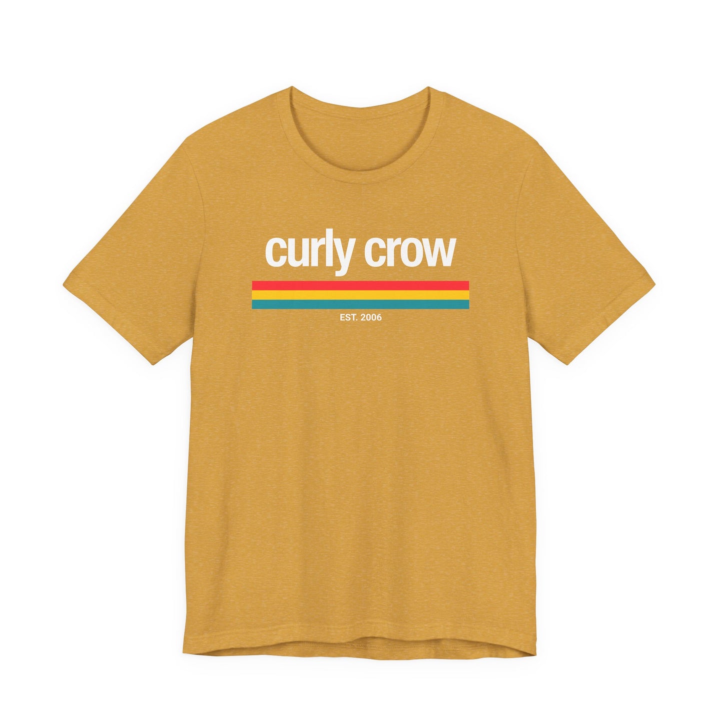 A mustard yellow heather short-sleeve t-shirt with a retro graphic on the chest reading 'curly crow' in white, underlined with red, yellow, and blue stripes, and 'EST. 2026' below.