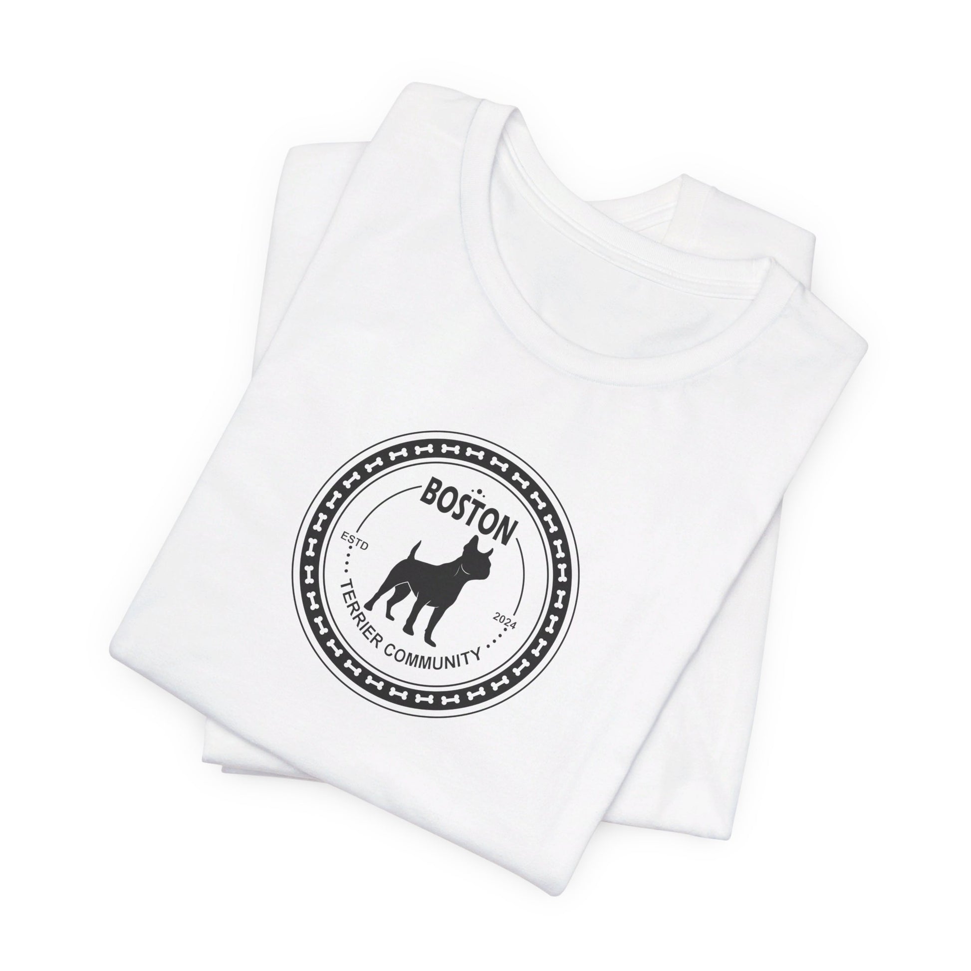 Curly Crow Boston Terrier graphic on a white folded shirt featuring a playful Boston Terrier