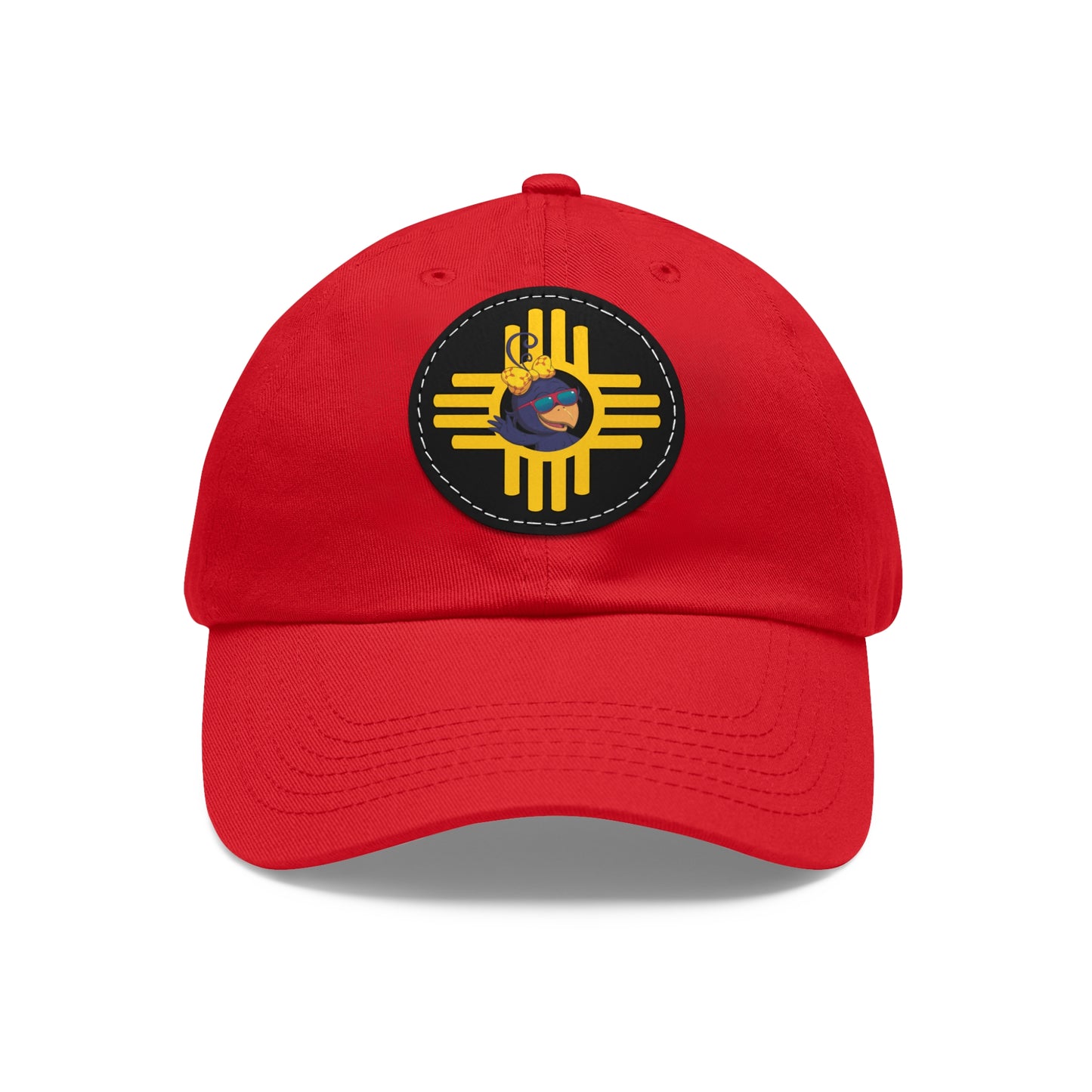 Red cap with a circular emblem featuring a yellow design on a white background